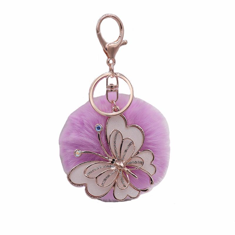 Exquisite Butterfly Plush Fur Ball Keychain for Bags, Cars, and Luggage.