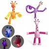 Long-necked Giraffe Stretching Toy With Suction Cup And Glow-in-the-dark Feature