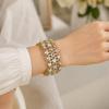 Stretch Bracelet with Repeating Figure-8 Links, Gold-Tone Zinc Alloy Design and Clear Decorative Rhinestones Details