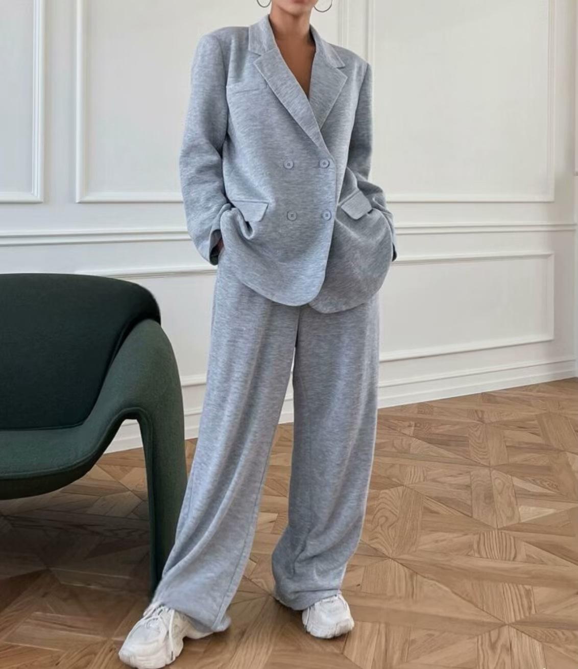 

Мужской светло-серый двубортный повседневный костюмный комплект с брюками широкого кроя XL светло-серый