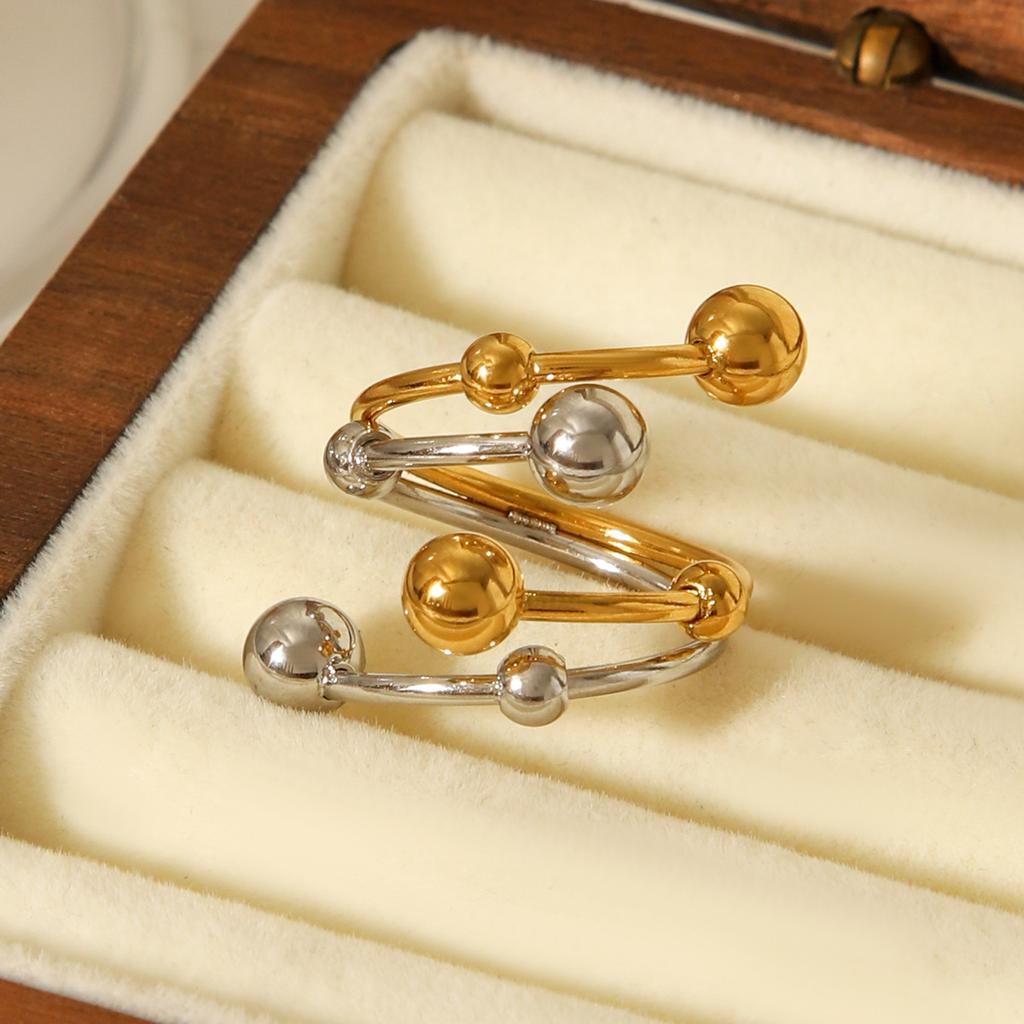 Gold- und silberfarbener Color-Block-Ring mit großen und kleinen Kugeln, zweilagig, leichter Luxus, Nischen-Design, Titanstahlring