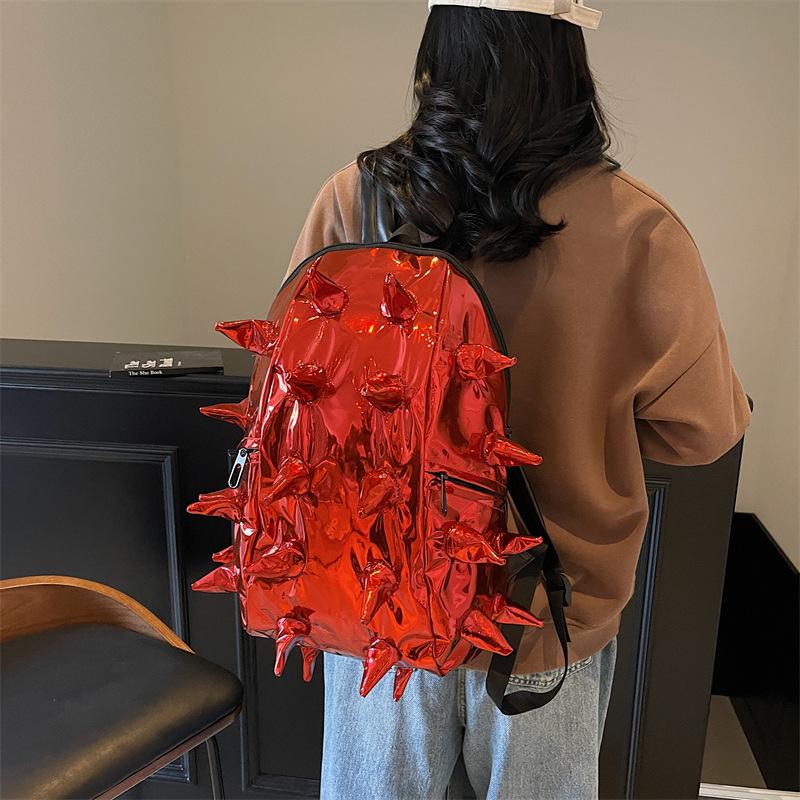 

Trendy backpack women s 2025 new personality creative three-dimensional hedgehog backpack large capacity shiny backpack золотий