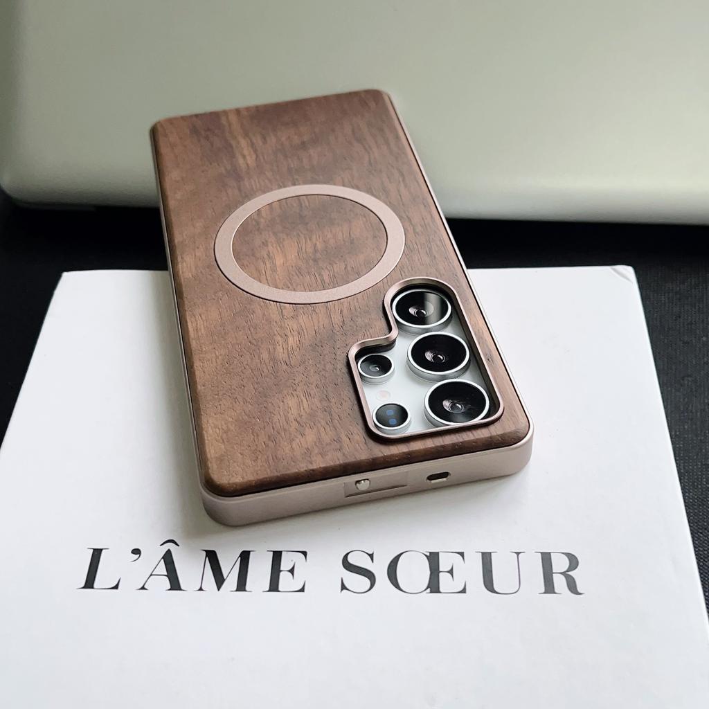 Suitable for Samsung S25ULTRA Elastic Buckle Mobile Phone Case Metal Frame Single-sided Peach Wood Back Plate Anti Fall Protection Case