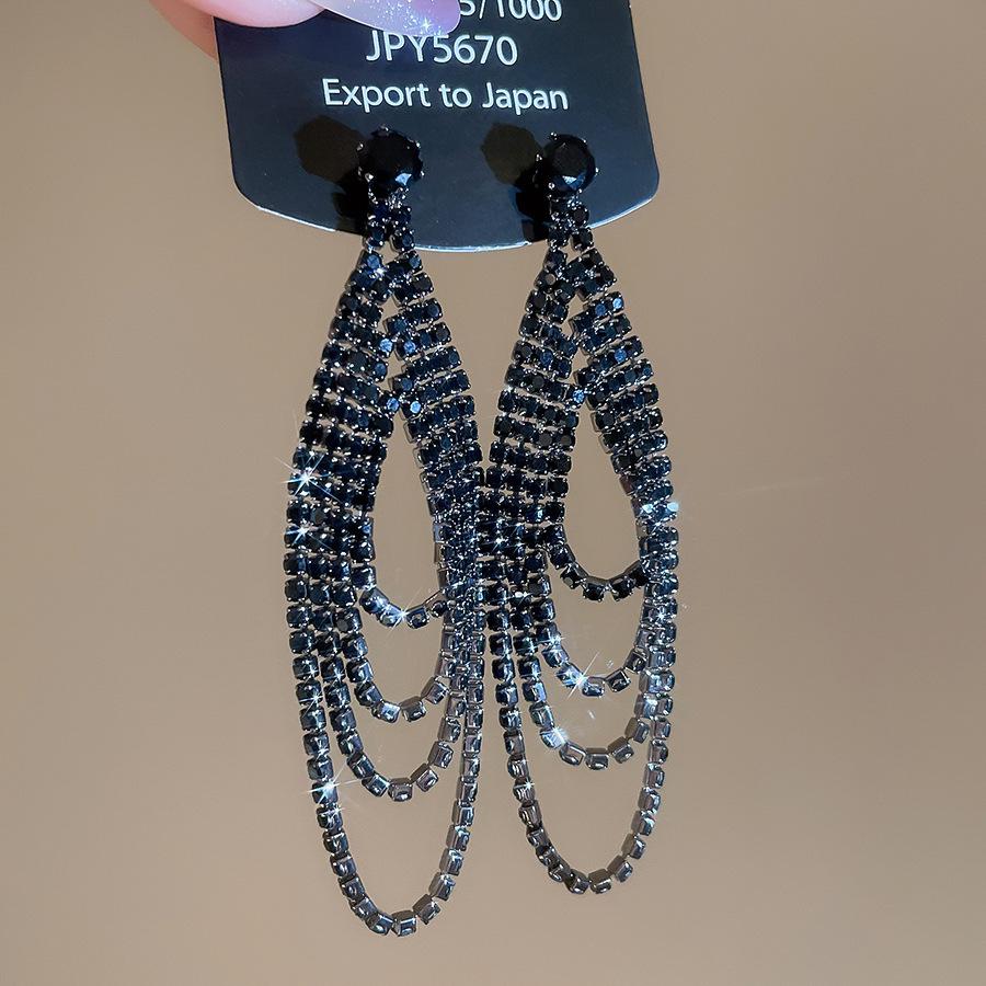 Silver Needle Water Drop Tassel Earrings - Light Luxury High-End Design for Women's Fashion.