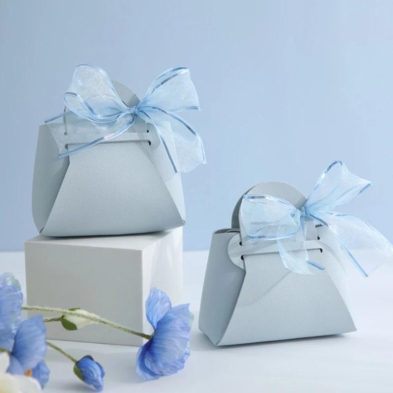 10 pezzi distribuiscono sacchetti regalo in pelle rosa, bomboniere per ospiti, mini borsetta con nastro, scatola per imballaggio di caramelle, decorazioni per feste