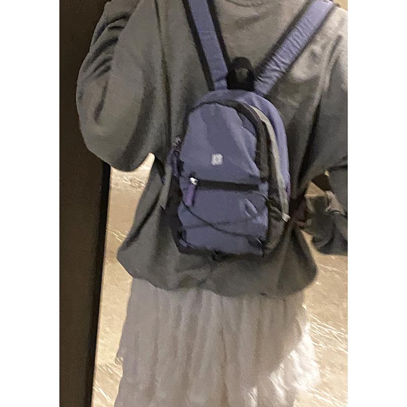 

Student casual nylon canvas bag women s 2025 summer new Korean version contrasting color backpack versatile travel bag фиолетовый