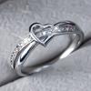 1A delicate, fashionable, romantic, and elegant heart-shaped ring with intricate interlaced hollow design, suitable as a gift for Valentine's Day,