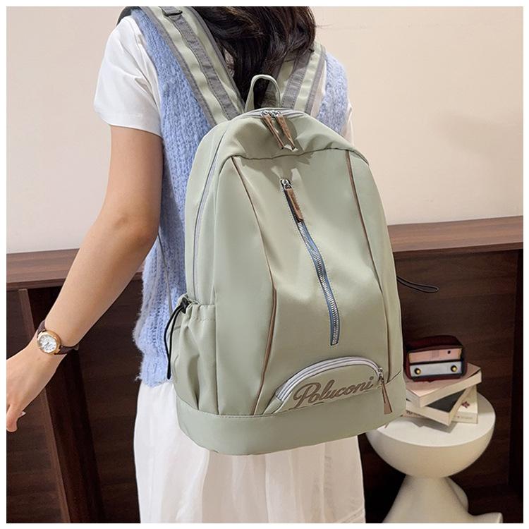 Schoolbag wholesale large-capacity college student backpack American embroidery bag women's Korean version backpack casual backpack