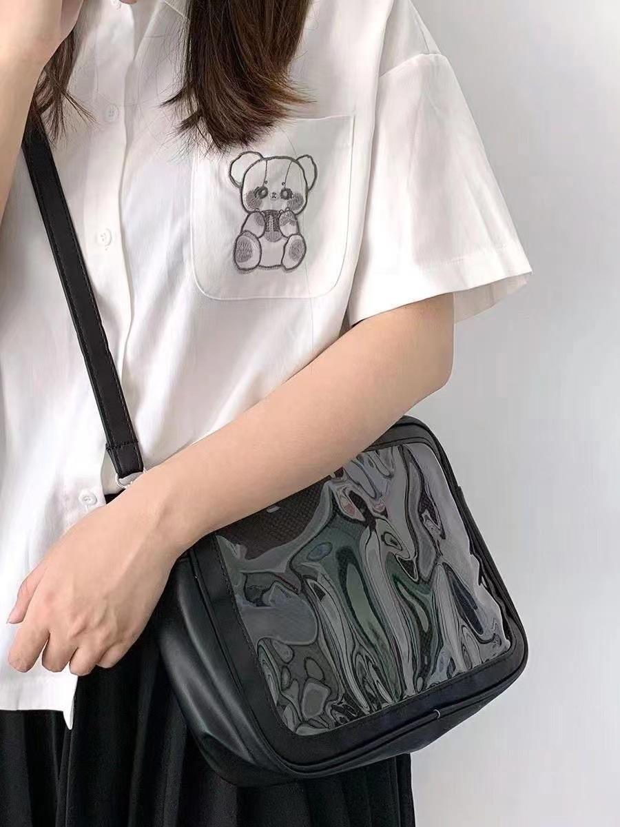 

Comic exhibition bag fashion trend new personalized texture oblique span bag shoulder pu uniform bag Japanese display transparent bag чорний