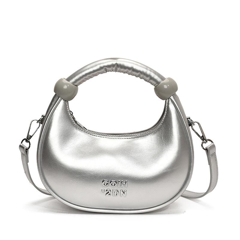 Super fire niche dumpling bag 2025 new spring and summer versatile shoulder messenger bag exquisite mini portable small bag