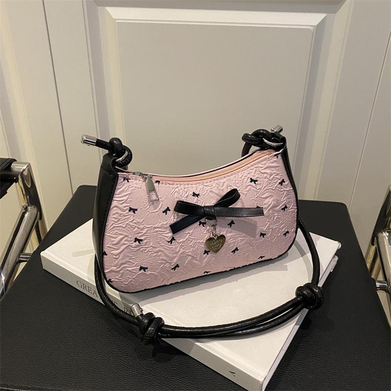 Niche design bow underarm bag women's 2025 new handbag fashion shoulder messenger bag sweet baguette bag
