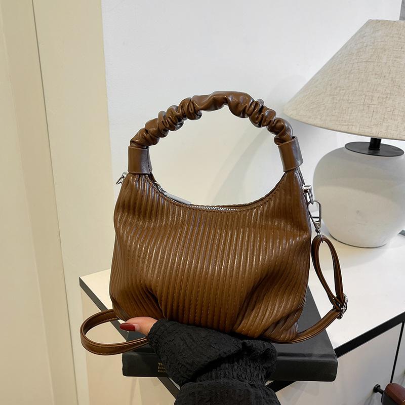 Niche personality pleated striped portable small bag women's fashion versatile underarm bag 2025 autumn and winter simple shoulder bag