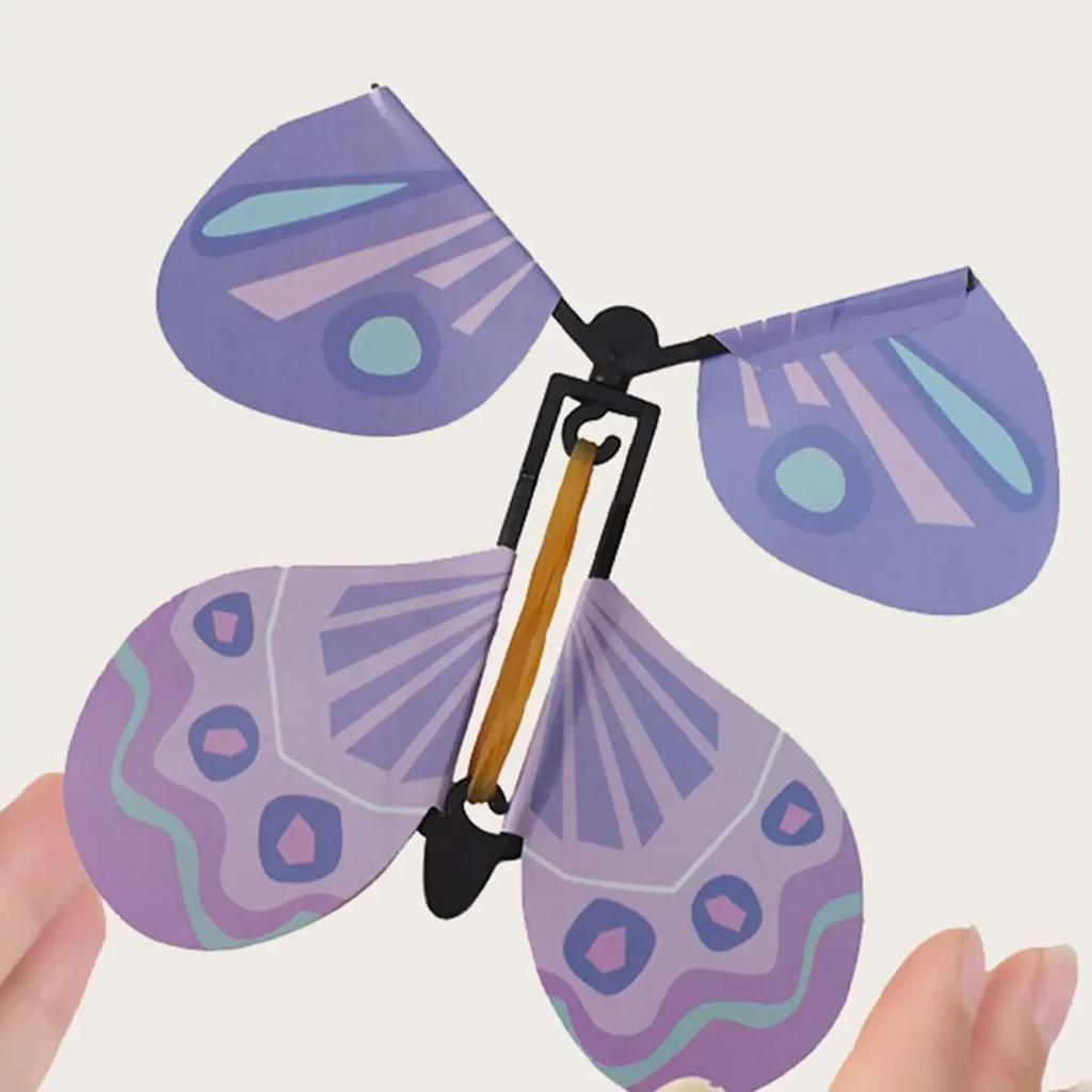 1PC  Magic Wind Up Flying Butterfly In The Book Rubber Band Powered Magic Fairy Flying Toy Great Surpris Gift Party Favor