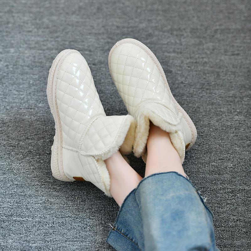 Thick-soled snow boots women's fur integrated 2025 new Zhou Dongyu same short tube winter velvet thickened cotton shoes