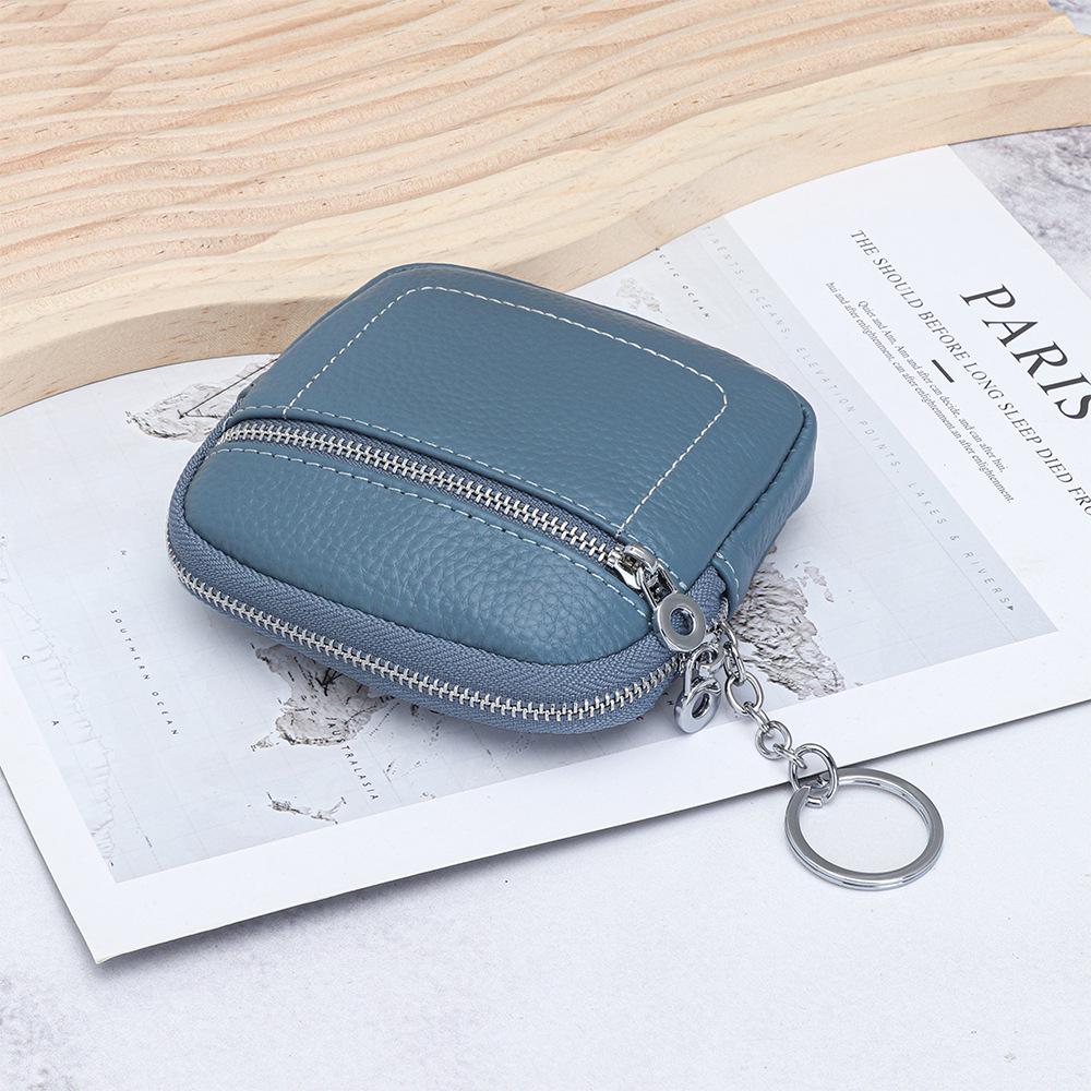 Women's Genuine Leather Mini Coin Purse with Zipper - Compact Storage for Driver's License, Lipstick, and Earphones.