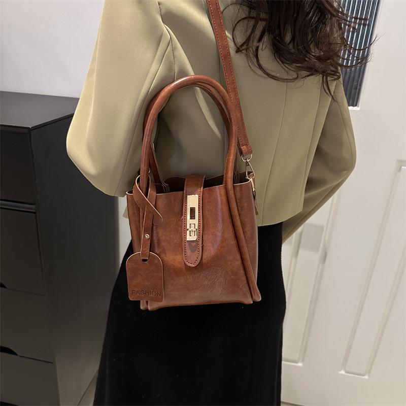 Fashionable Hand-held Bucket Bag for Women's Spring New Niche Design and Fashion Trendy Crossbody Bag
