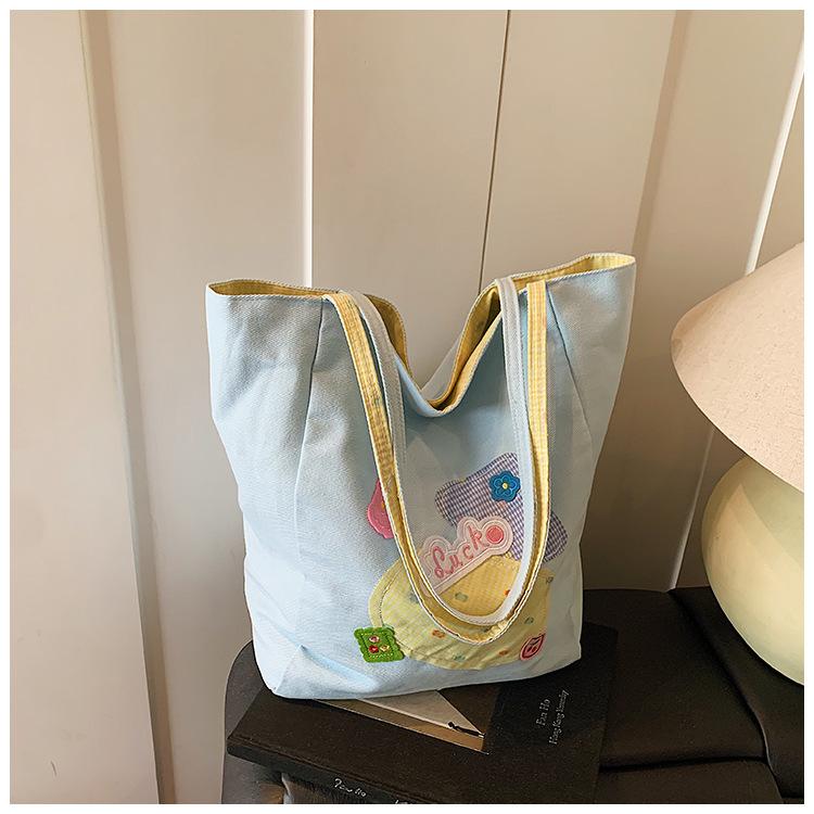 

Холщовая женская сумка большой вместимости 2025 новая модная милая мультяшная сумка-тоут на плечо