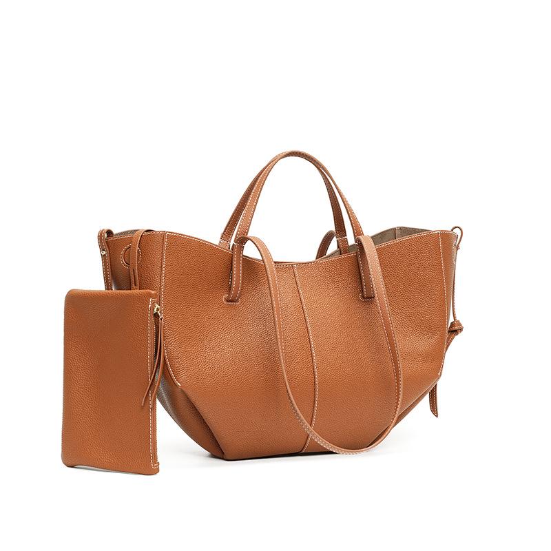 Women s Versatile Genuine Leather Tote - High-End Cowhide Shoulder Handbag with Large Capacity.