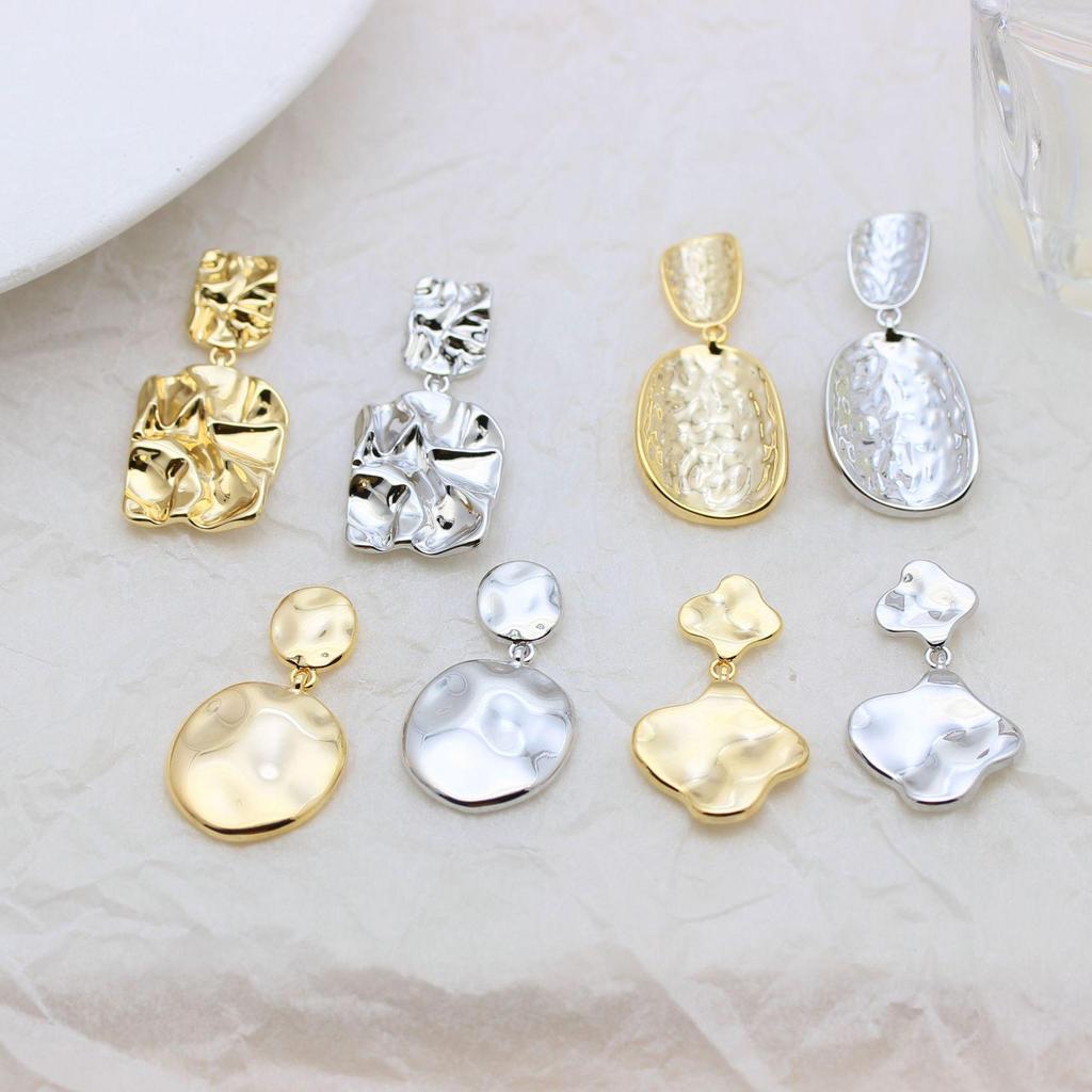 Gold Alloy Geometric Stud Earrings with Pleated Design