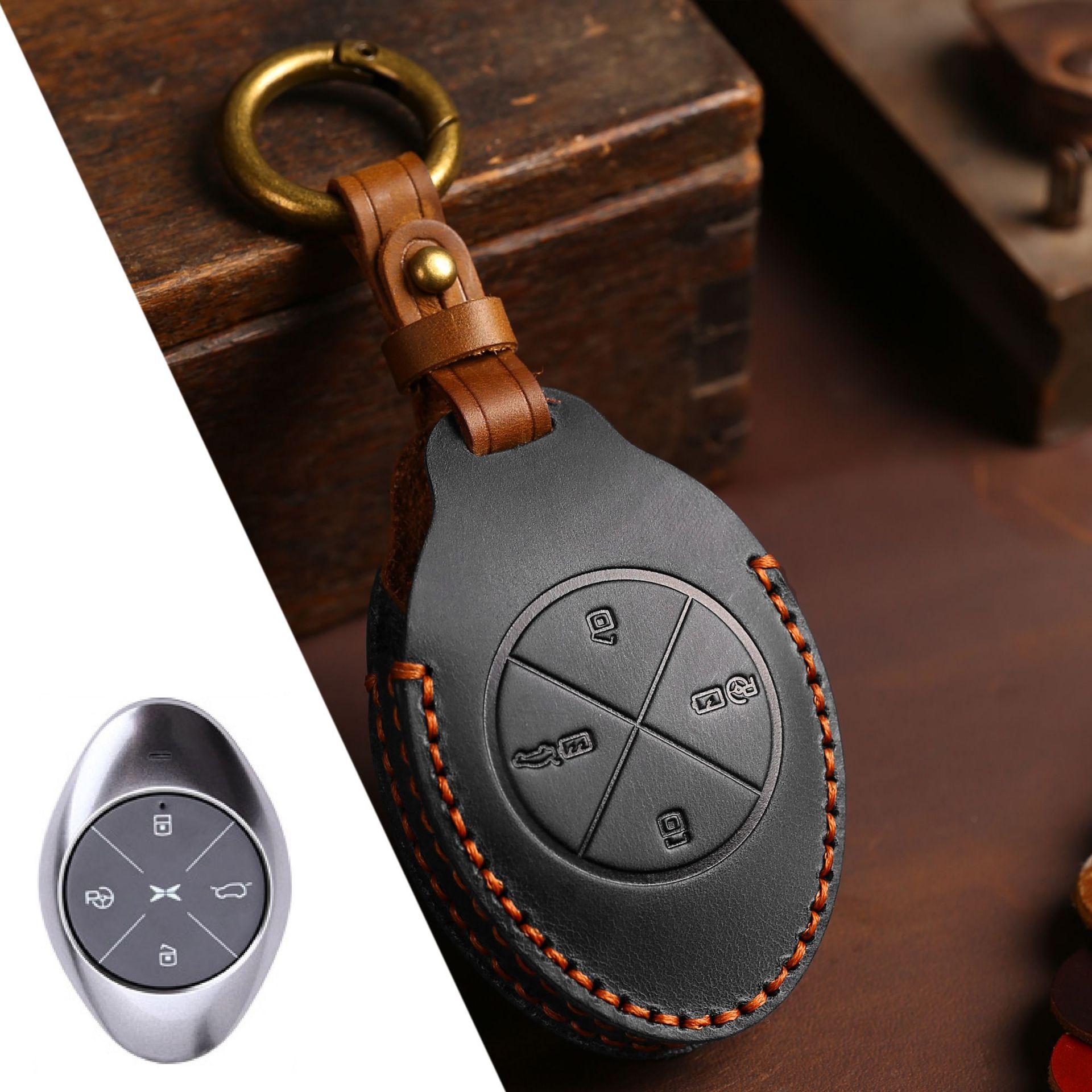 

Applicable to XPeng Motors key case P7 genuine leather G3 key case high-end protective case 2021 all-inclusive cowhide чёрный
