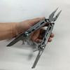 Stainless Steel Folding Multitool Pliers with Saw Screwdriver Can Opener Bottle Opener for Camping Hiking Survival 4