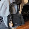 Korean version of high-value niche shoulder bag 2025 autumn new solid color fashion trend glossy underarm handbag women