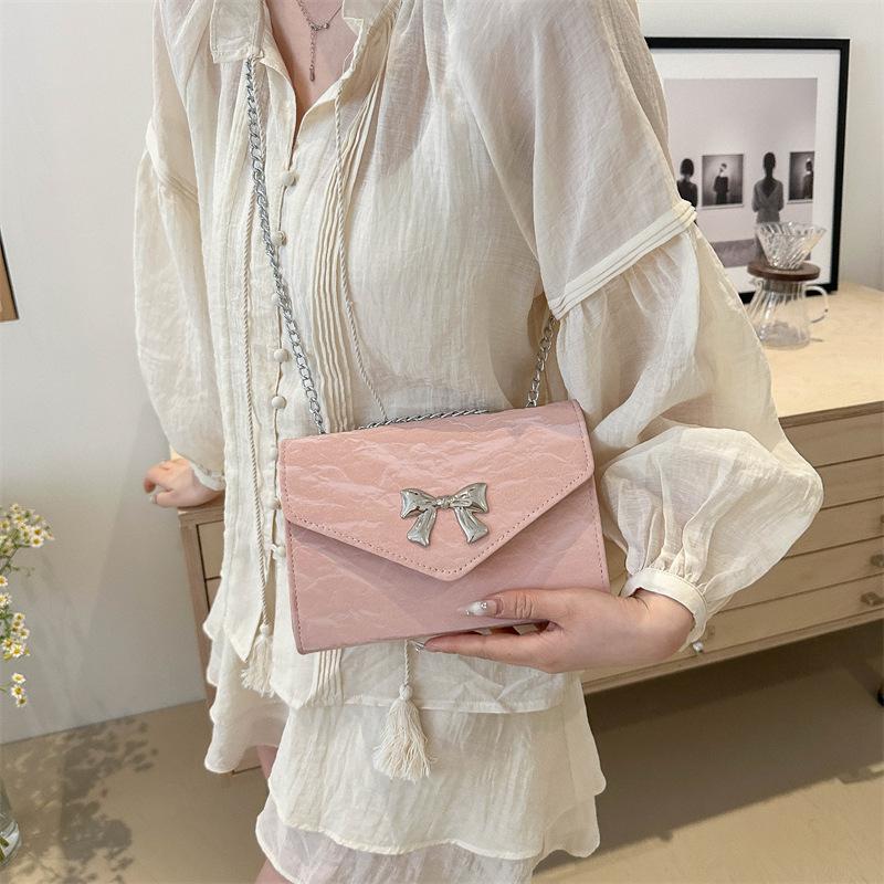 Textured bag women's 2025 new bow chain shoulder bag foreign style personality trendy crossbody commuter small square bag