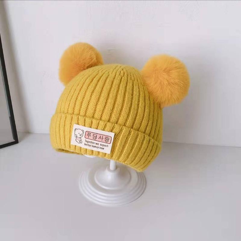 Autumn and winter children's hats baby beige series boys and girls windproof ear protection warm knitted cartoon ear warm