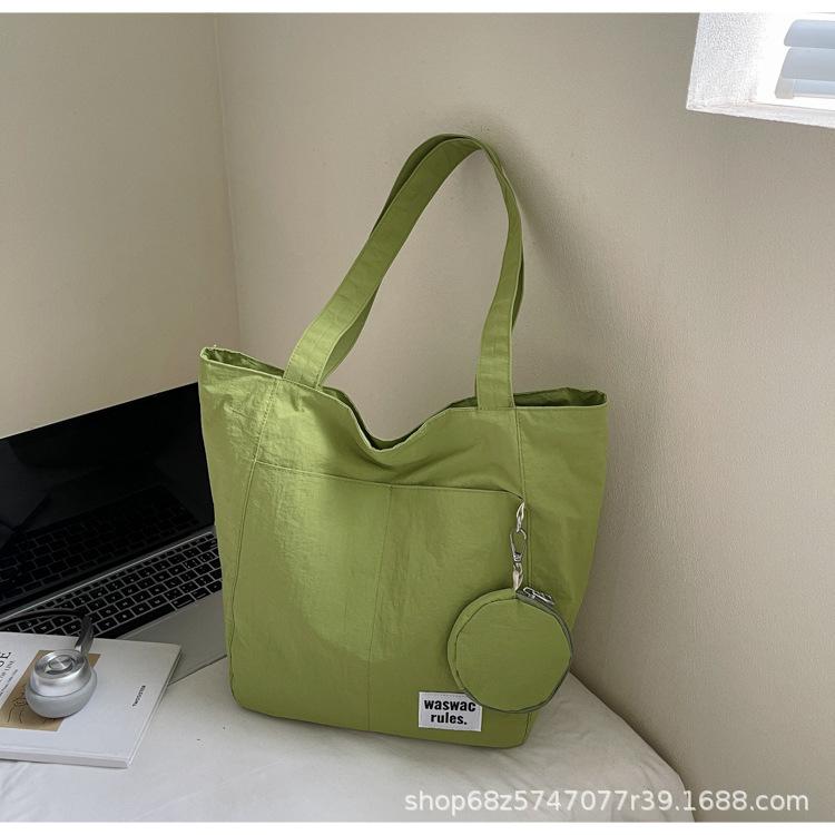 Japanese new waterproof nylon casual spring and summer shoulder bag women's design sense large-capacity commuter tote bag