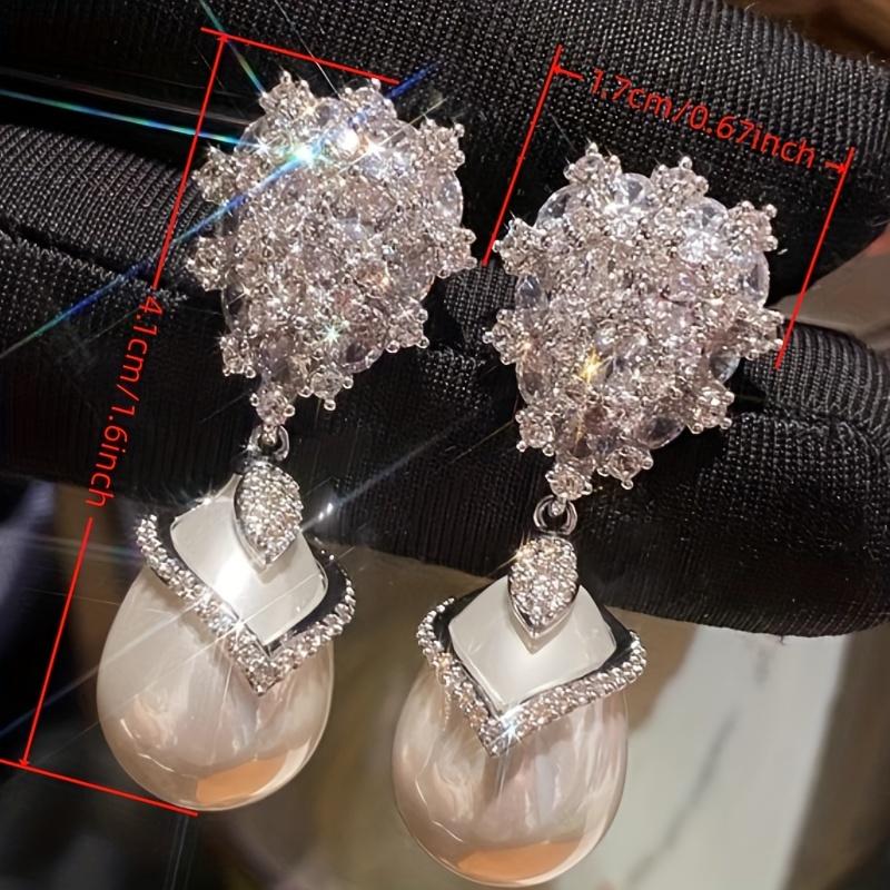 Fashion flower zircon dangle earrings with faux pearl pendant. Luxury bridal style for wedding and banquet occasions.
