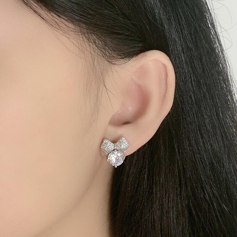 Selling Japanese ,Korean ,European American Personality Adorable Bow Zirconia Sterling Tone Earrings Trendy Stylish FemalePersonality