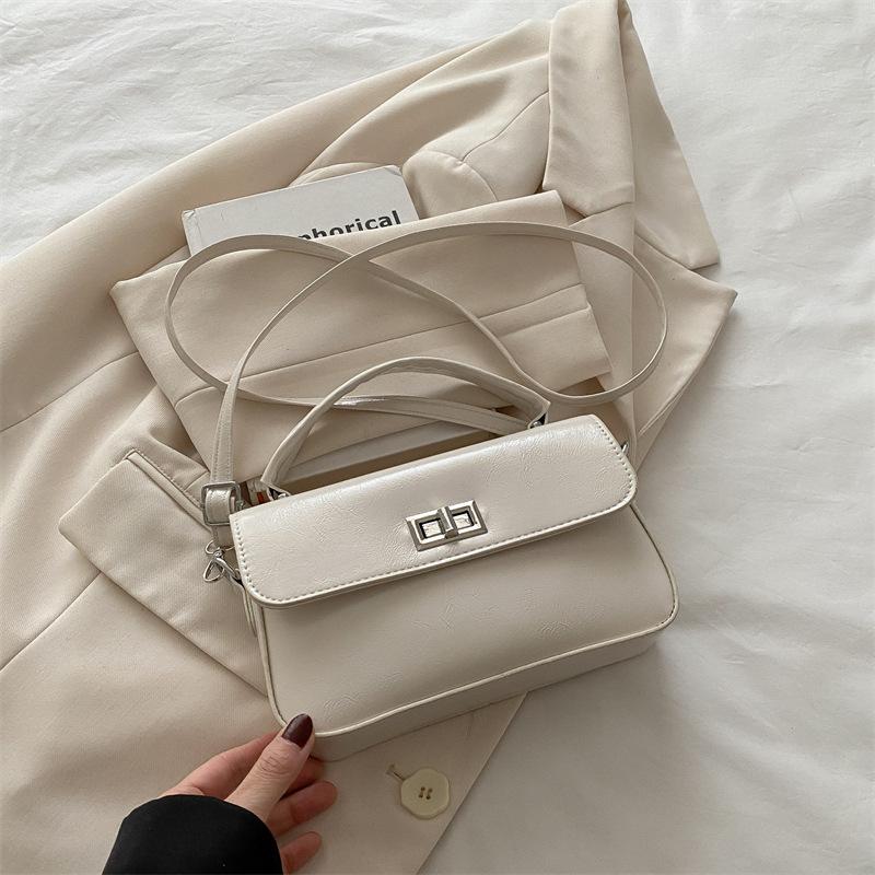 This year's popular small bag women's 2025 new versatile black portable small square bag simple lock shoulder messenger bag