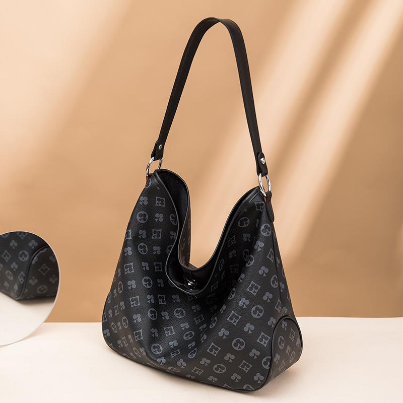 

Spring new commuter tote bag large-capacity women s bag versatile printed soft leather shoulder armpit bag