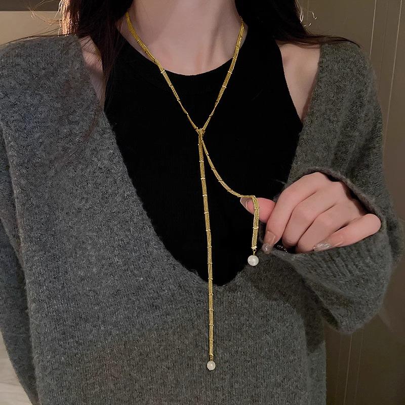 Pure Silver Pullable Long-style Pearl Necklace for Women, in A Cold and Elegant Style, with A Simple Sweater Chain for Pulling.