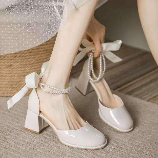 2025 summer new versatile round head thick heel bag head pearl bow light mouth hollow sweet Mary Jane shoes women