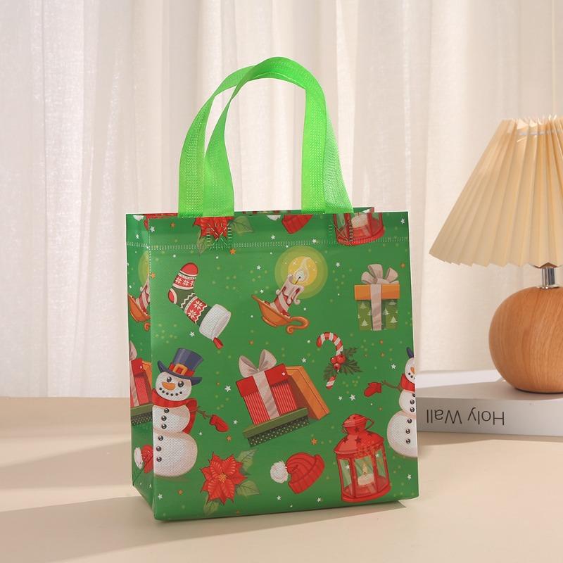 

1 шт. Нова в різдвяних подарункових пакетах Мультяшний милий принт Друк Санти Лося Сніговика Нетканий складний мішок для зберігання Ручна сумка Приладдя для вечірок 23x22x11cm зелений