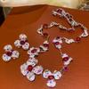 Elegante Set di Gioielli Floreali Geometrici con Zirconi: Collana e Orecchini a Bottone di Lusso