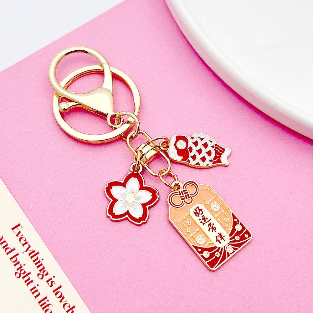 Japanese Sakura Koi Omamori Amulet Keychain for Luck, Wealth & Safety - Charming Couple's Accessory