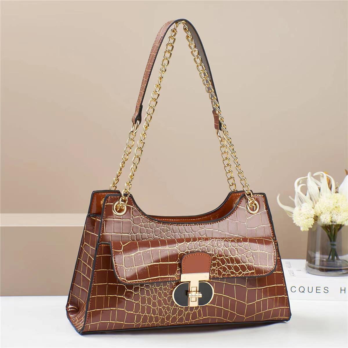 

Нова кам яна маленька сумка Проста темпераментна сумочка Світла розкішна жіноча сумка Зрілий сенс Сумка на плече Сумка кросбоді .