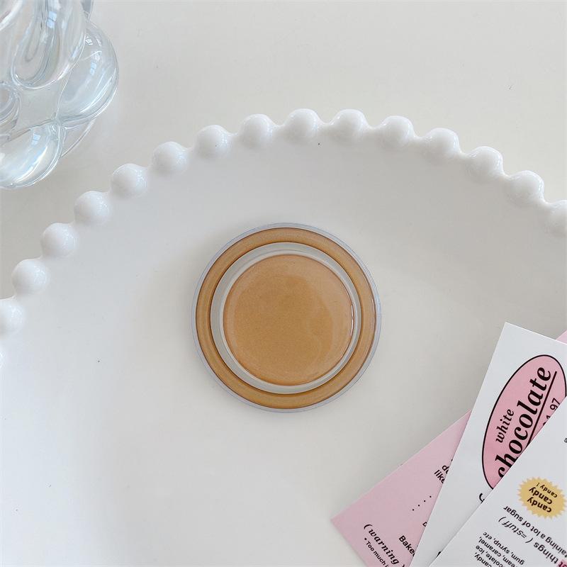 

Прозора магнітна подушка безпеки Macaron для телефону з логотипом для друку including magnetic ring коричневий