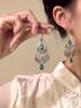 Retro ethnic style round hollow earrings Bohemian temperament elegant earrings niche fashion light luxury earrings women
