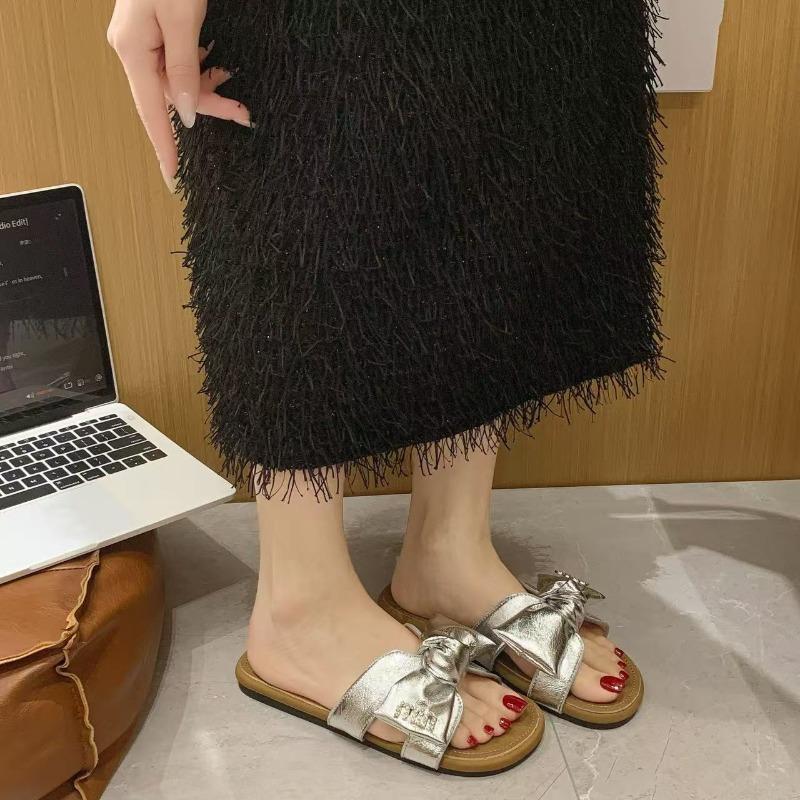 Summer new women's shoes flat-soled wear cool slippers bow fashion one-word drag soft-soled beach shoes