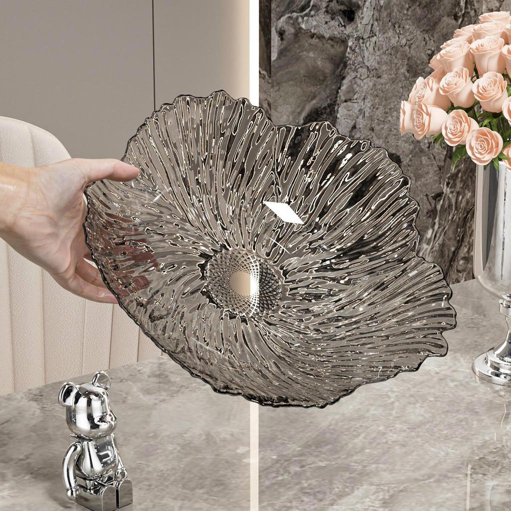 Transparente Obst- und Snack-Präsentationsplatte mit hohem Fuß: Modernes Licht-Luxus-Design für Wohnzimmer-Couchtische.