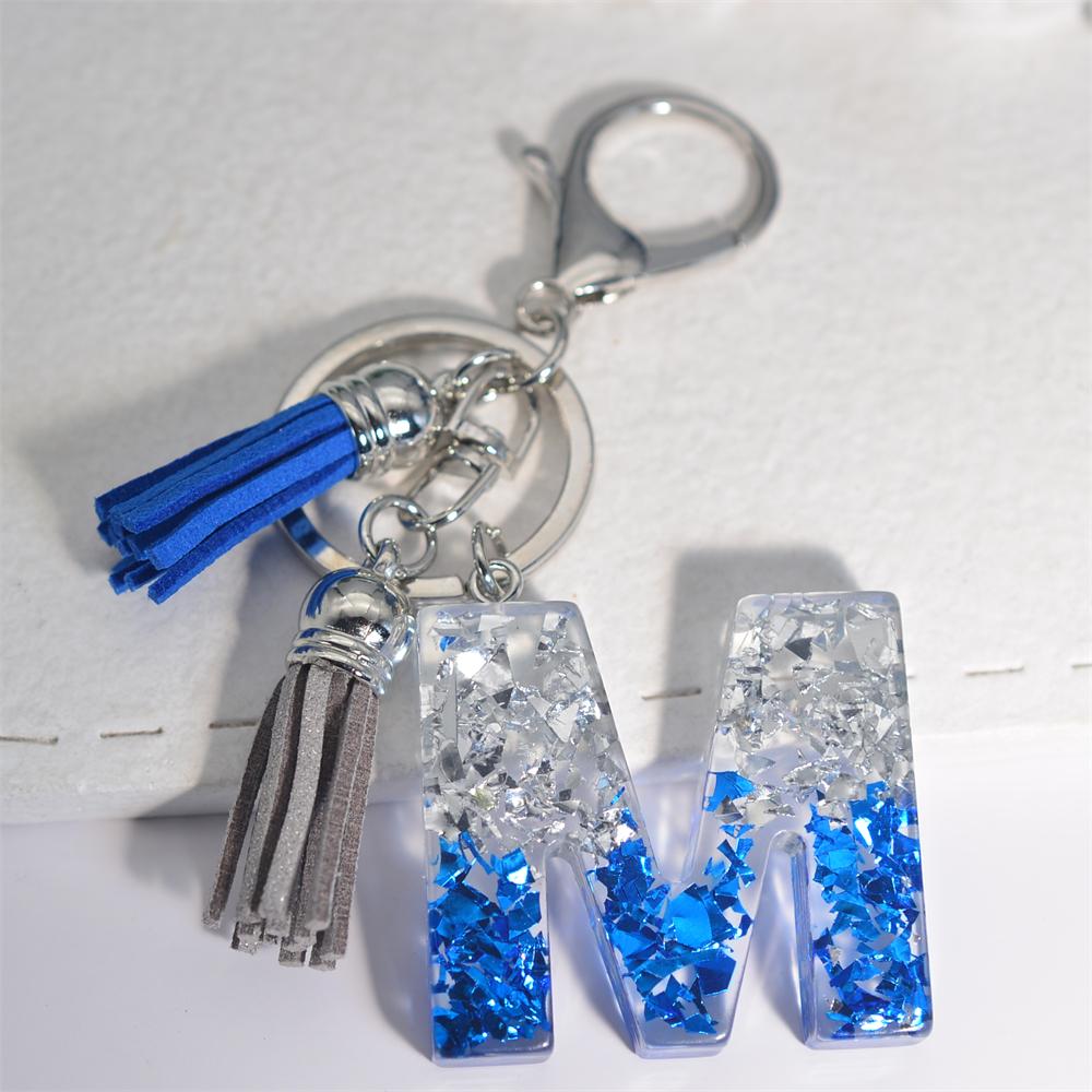 Креативные брелки из смолы с 26 буквами и кисточками — фото 7