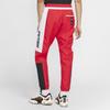 Nike Pantalon tissé à revers à blocs de couleurs pour hommes, bas rouge CK4396-657