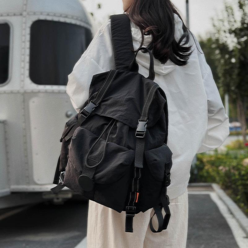 New outdoor large-capacity waterproof and lightweight backpack women's travel mountaineering computer backpack male student schoolbag