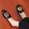 Slippers men's bags and embroidered bag heads wear sandals when they go out, and men's loafers with one foot.