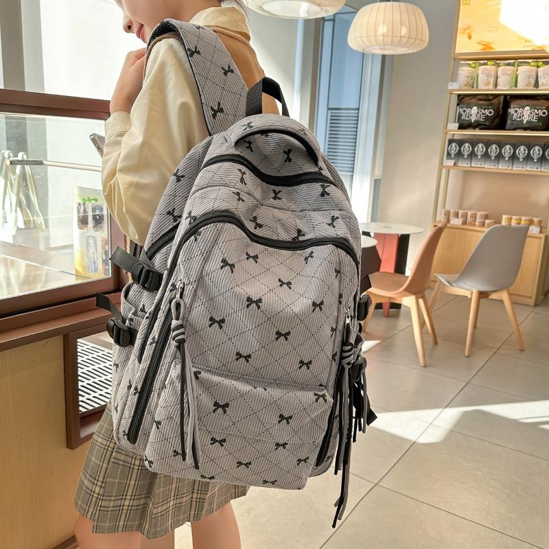 Bow Print Corduroy Backpack Casual Fashion Daily Bag Large Capacity School Bag for Students Minimalist Design Commute Travel with Tassel Accents