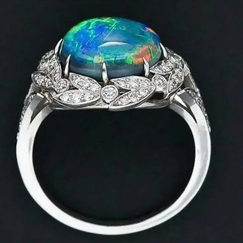 Einzigartiger silberfarbener Ring mit funkelndem weißem Kristall Zirkon Strassring Bunter Opalring für Damen Party