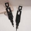 Zircon diamond-encrusted hollow square fringed silver needle earrings, dark wind personality, light luxury earrings.